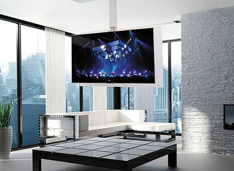 Потолочный телевизор иногда лучше, чем настенный телевизор. Одной из лучших причин является возможность поворота телевизора на 360 градусов для просмотра с любого места. Изображение: Architect Magazine