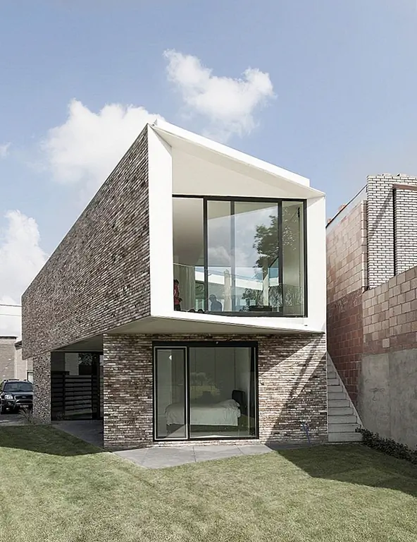 Элегантный подход к семейному дизайну дома в Бельгии: дом K