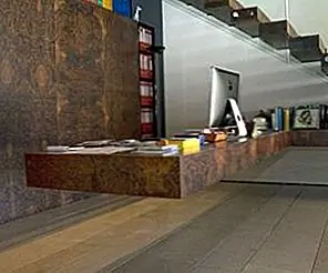 Скульптурный дом в Мадриде с темными гранитными и мраморными акцентами