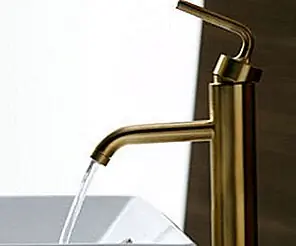 Покрашенные золотые смесители для ванны от Kohler