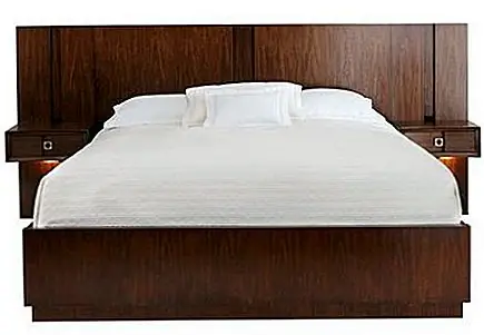 Кровати изготавливаются из твердых пород древесины с ореховыми шпонами и ламинированными пиломатериалами. Они отделаны теплым коричневым ореховым тоном. Ночные тумбы имеют простой дизайн, а также имеют очень функциональный выдвижной ящик. У них также есть свет внизу, если вам что-то нужно ночью.