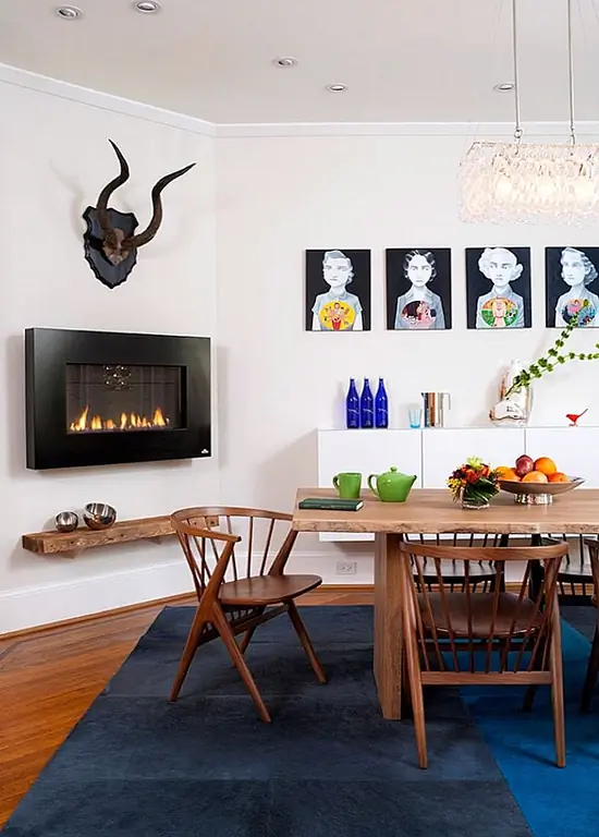 Иногда металлическая конструкция может быть простым настенным газовым камином. Изображение: Design Milieu