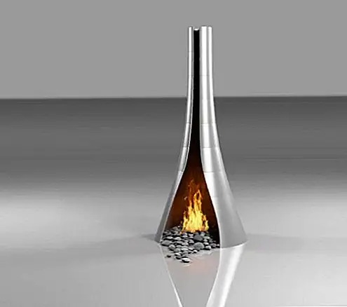 Это экстремальный дизайн, который будет более чем удовлетворять вам необъяснимое притяжение к каминам. Это не обычный камин. Ничего об этом не бывает. Не форма, не используемые материалы и, конечно, не место. Кто сказал, что камин должен оставаться внутри? Не стесняйтесь использовать это, как хотите.