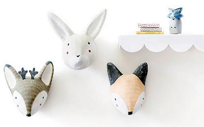 «Crate & Kids» предлагает веселые, легкие, легкие в общении бумажные Mache Wild Animals, по 29 долларов каждый.