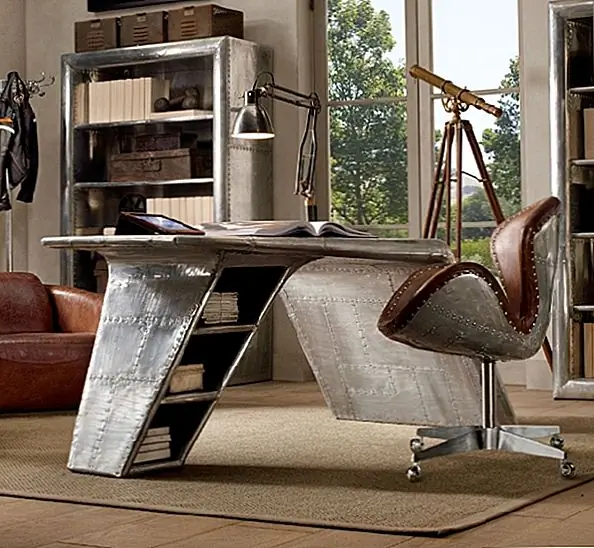 Оригинальный стол, имитирующий изогнутое крыло самолета