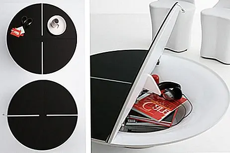 Этот современный журнальный столик имеет элегантный и стильный дизайн с черным и белым покрытием. Это называется Loto, и он был разработан итальянской компанией Com.p.ar. он имеет алюминиевую основу с яркой белой лаковой отделкой и круглой черной столешницей, которая открывается и открывает полезное пространство для хранения таких вещей, как журналы и другие мелкие предметы.