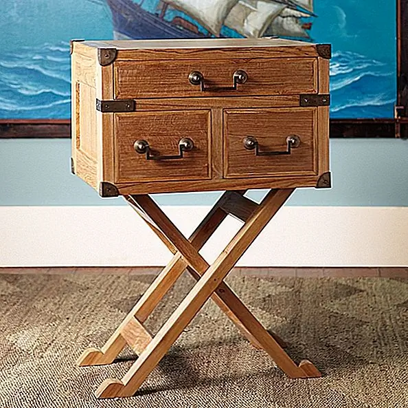 Overland Cross Table изготовлен из тика и имеет латунное оборудование. Габаритные размеры стола составляют 19,5 "Ш x 15,5" D x 29 "H. При доставке для продукта потребуется единовременная сборка. Это простой процесс и инструкции включены. Поскольку верхняя часть стола тяжелая и может представлять опасность для детей, если они тянут ручки ящиков, в комплект входят мебельные настенные ремни и могут использоваться для крепления стола к стене. Доступны для 395 $.