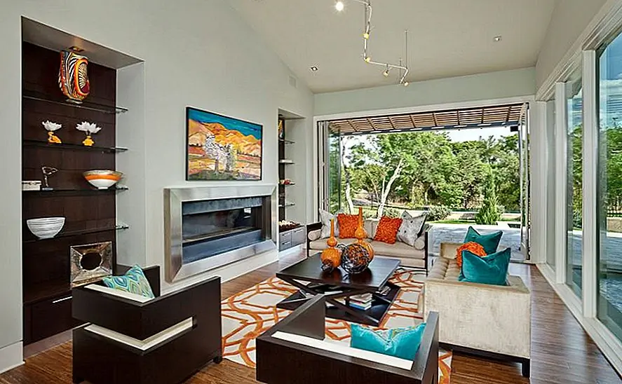 Нам нравится, как эта гостиная имеет немного тропических ароматизаторов. Между бирюзой и манго подчеркивается, что ваш дом станет летним вдохновением! {Найден на decorumhome}.