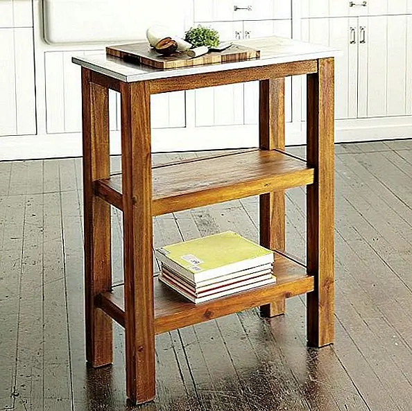 Габаритные размеры этого продукта составляют 30 "x 14,5" d x 38 "h. Это не занимает много места, а также имеет компактный дизайн. Это легко сочетается с различными дизайнами, а также универсальным с точки зрения стиля и материалов. Он имеет твердую деревянную раму из акации и верхнюю часть из нержавеющей стали. Некоторая сборка требуется при поставке, но это простой и простой процесс. Не только, что этот блок добавляет полезное пространство на кухне, но и очень практично и в других целях. Устройство компактно, но оно также обеспечивает практическое пространство для хранения. Он оснащен двумя полками, идеально подходящими для хранения кухонных принадлежностей. Доступен за 242 евро.